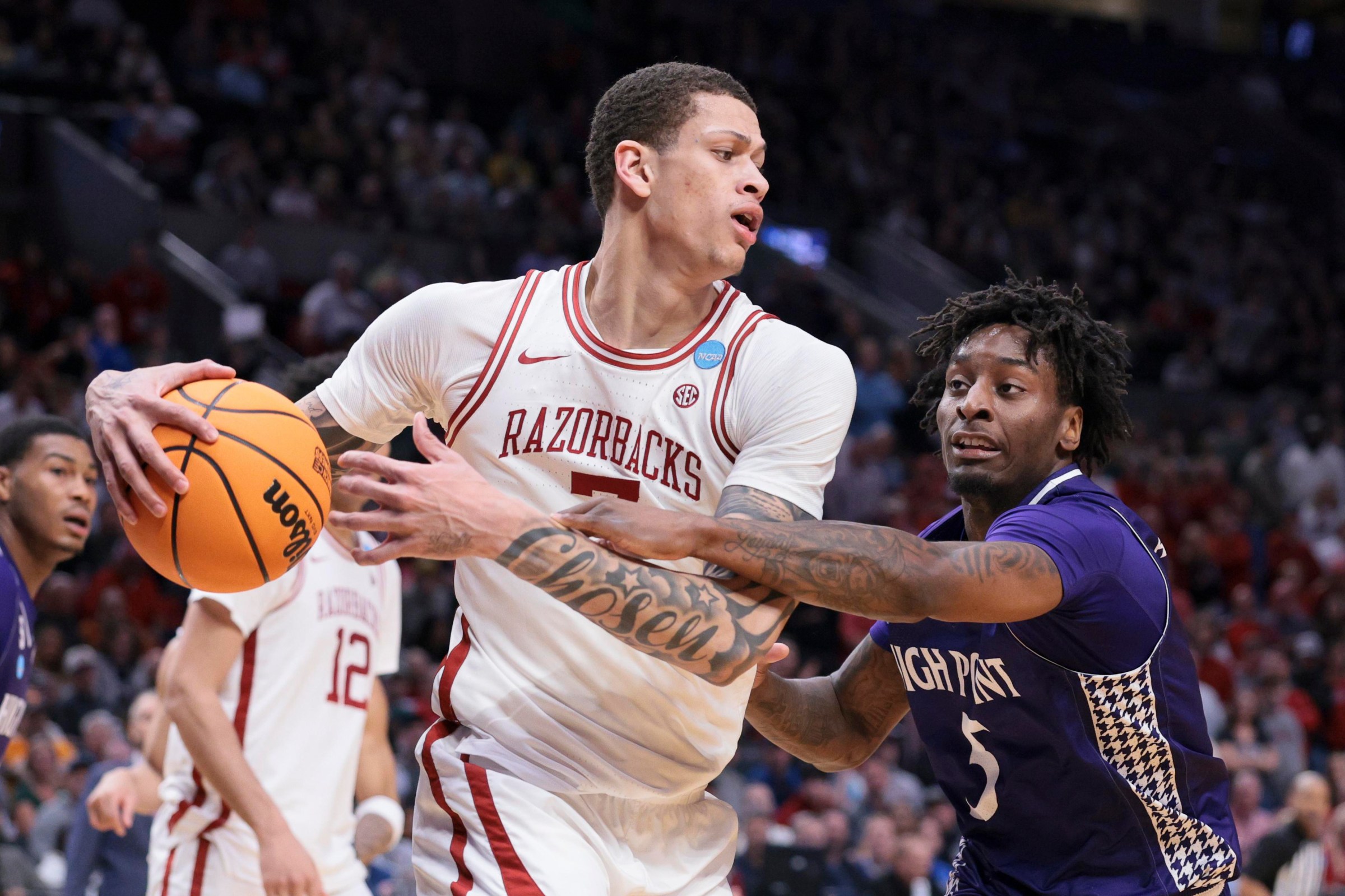 PORTLAND, OREGON - MARCH 21: Trevon Brazile #7 of the Arkansas Razorbacks handles the ball against Terry Anderson #5 of the High Point Panthers during the second half of the second round of the 2026 NCAA Men’s Basketball Tournament held at Moda Center on March 21, 2026 in Portland, Oregon. (Photo by C. Morgan Engel/NCAA Photos via Getty Images)