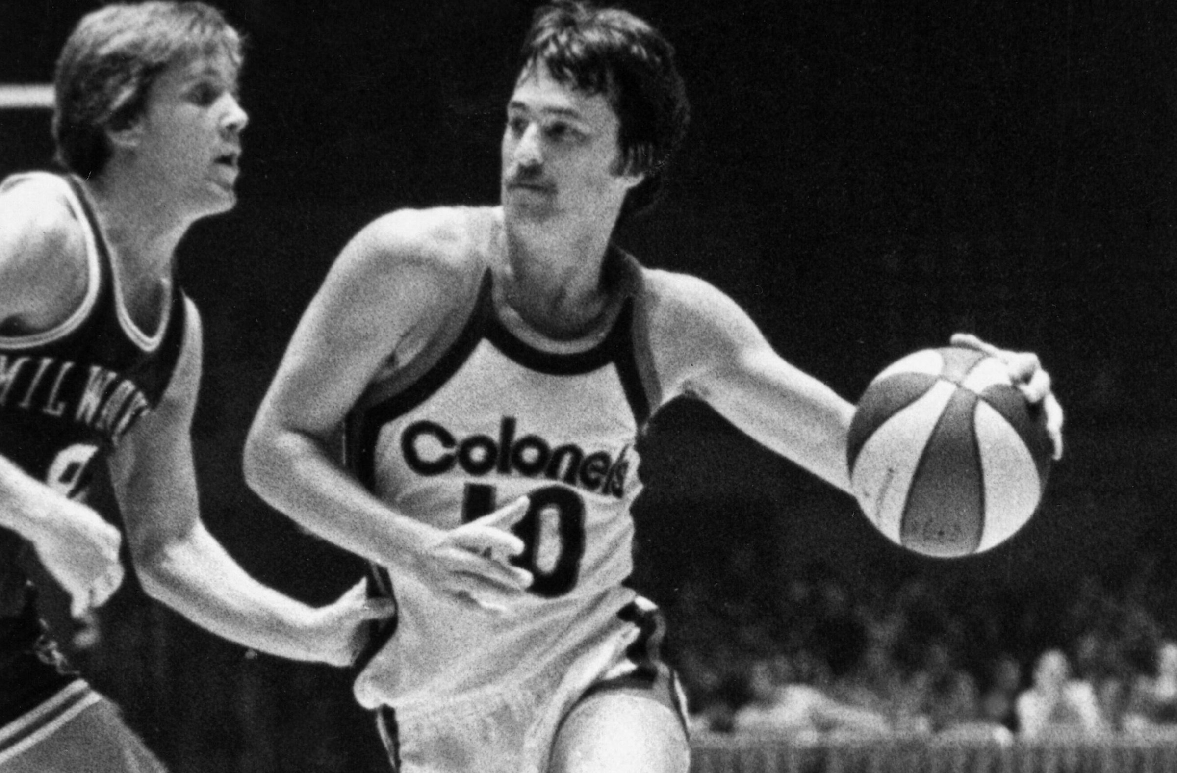 LEXINGTON, KY - 1975: Louie Dampier of the Kentucky Colonels dribbles during a game played circa 1975 at Freedom Hall in Lexington, Kentucky. NOTE TO USER: User expressly acknowledges and agrees that, by downloading and or using this photograph, User is consenting to the terms and conditions of the Getty Images License Agreement. Mandatory Copyright Notice: Copyright 1975 NBAE (Photo by NBA Photos/NBAE via Getty Images)