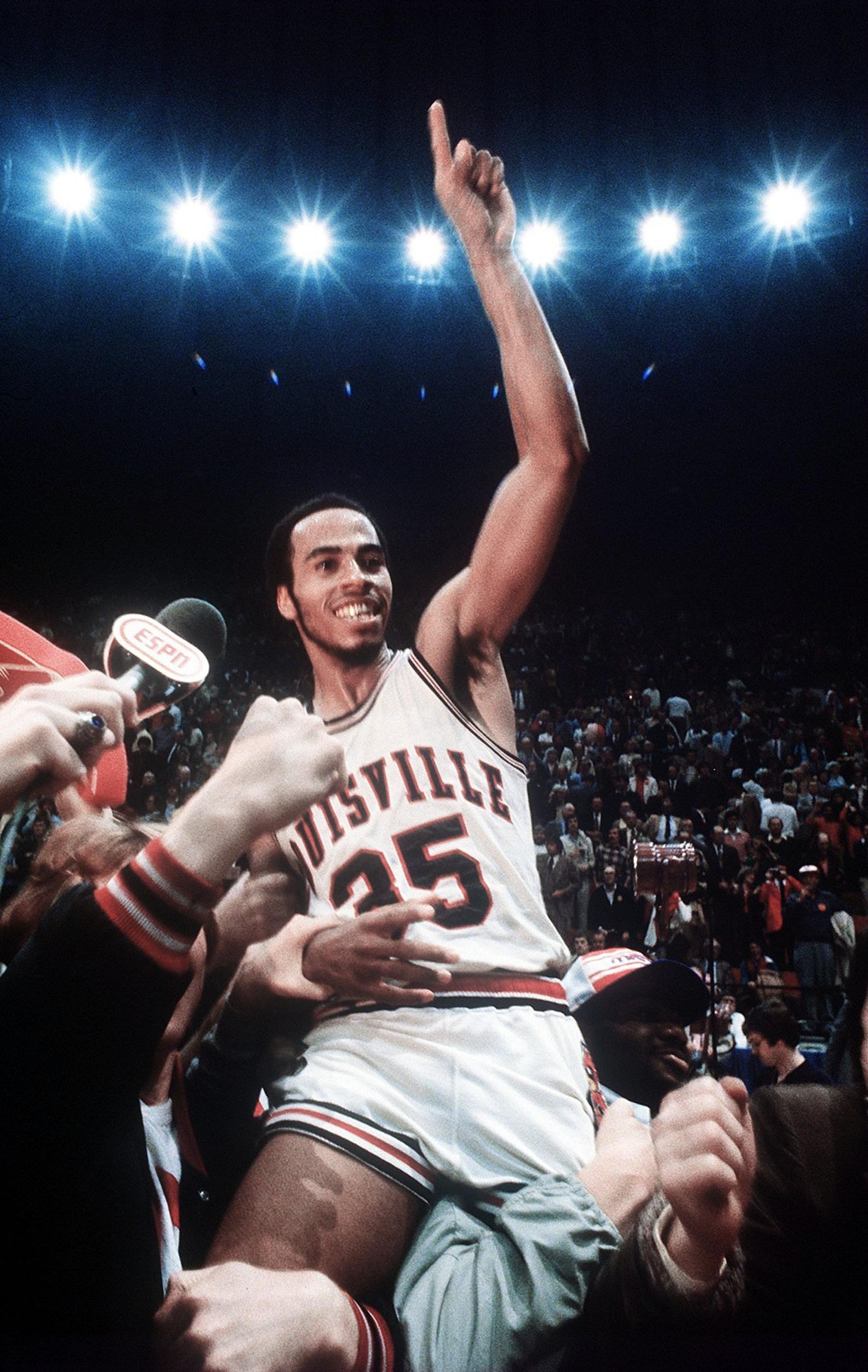 UNITED STATES - MARCH 24: College Basketball: NCAA Final Four, Louisville Darrell Griffith (35) victorious, getting carried off court by team after winning game vs UCLA, Indianapolis, IN 3/24/1980 (Photo by Rich Clarkson/Sports Illustrated via Getty Images) (SetNumber: X24328 TK2)