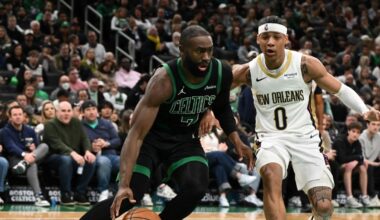 Jaylen Brown #7 of the Boston Celtics drives to the basket against Jeremiah Fears #0 of the New Orleans Pelicans at TD Garden.