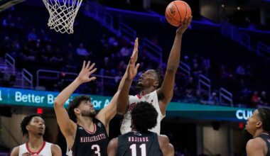 Miami (Ohio) guard Trey Perry (1) drives past Ohio forward Javan Simmons (1) during the first half of an NCAA college basketball game, Friday, March 6, 2026, in Athens, Ohio. (AP Photo/HG Biggs)