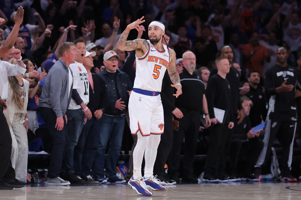 New York Knicks guard Jose Alvarado (5) reacts in the fourth quarter against the San Antonio Spurs during game four of the 2026 NBA Finals at Madison Square Garden. 