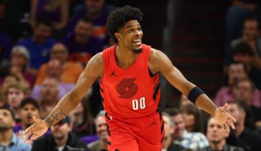 Apr 14, 2026; Phoenix, Arizona, USA; Portland Trail Blazers guard Scoot Henderson (00) reacts against the Phoenix Suns in the first half during the play-in rounds of the 2026 NBA Playoffs at Mortgage Matchup Center. Mandatory Credit: Mark J. Rebilas-Imagn Images