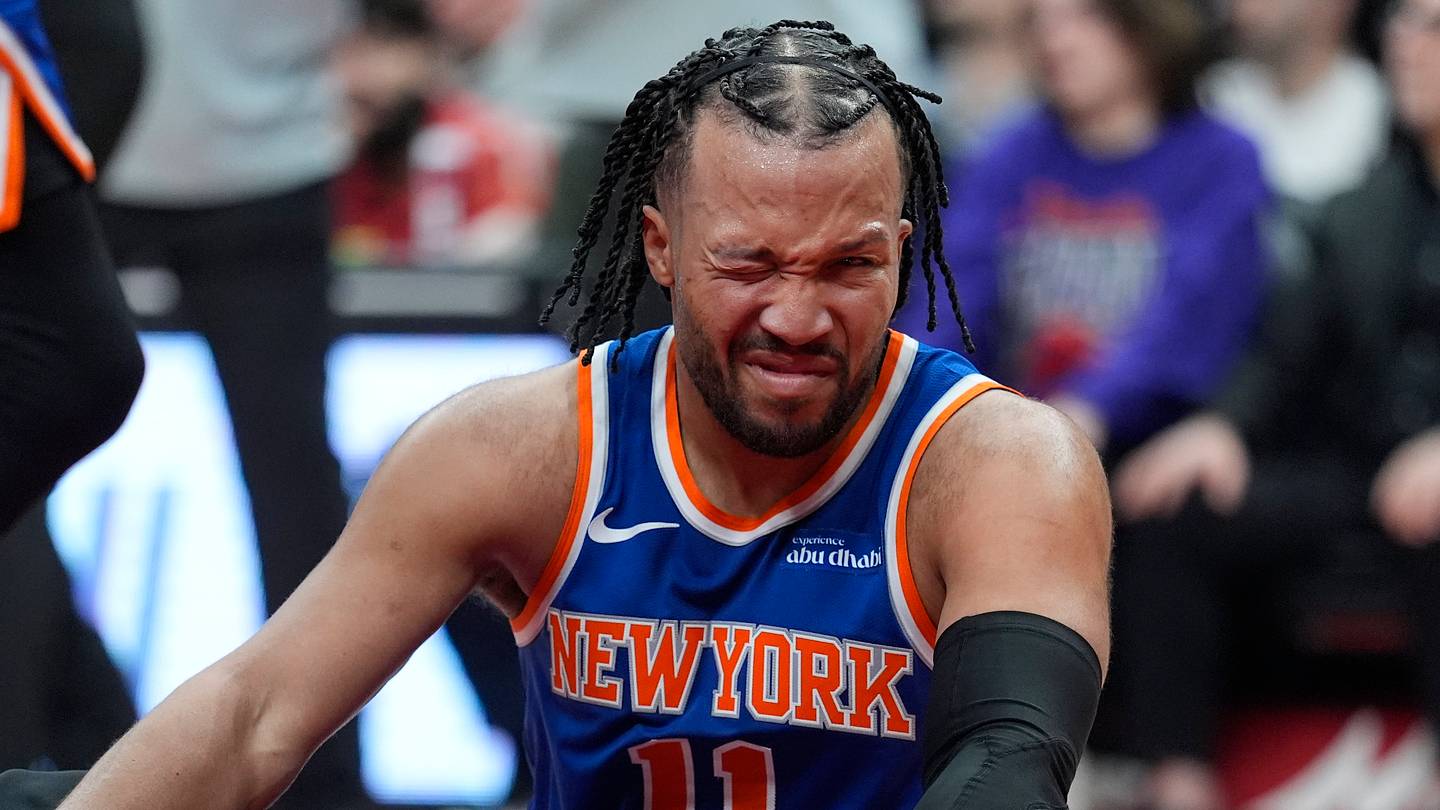 Mar 3, 2026; Toronto, Ontario, CAN; New York Knicks guard Jalen Brunson (11) reacts after getting poked in the eye during a collision with a Toronto Raptors player during the second half at Scotiabank Arena. Mandatory Credit: John E. Sokolowski-Imagn Images