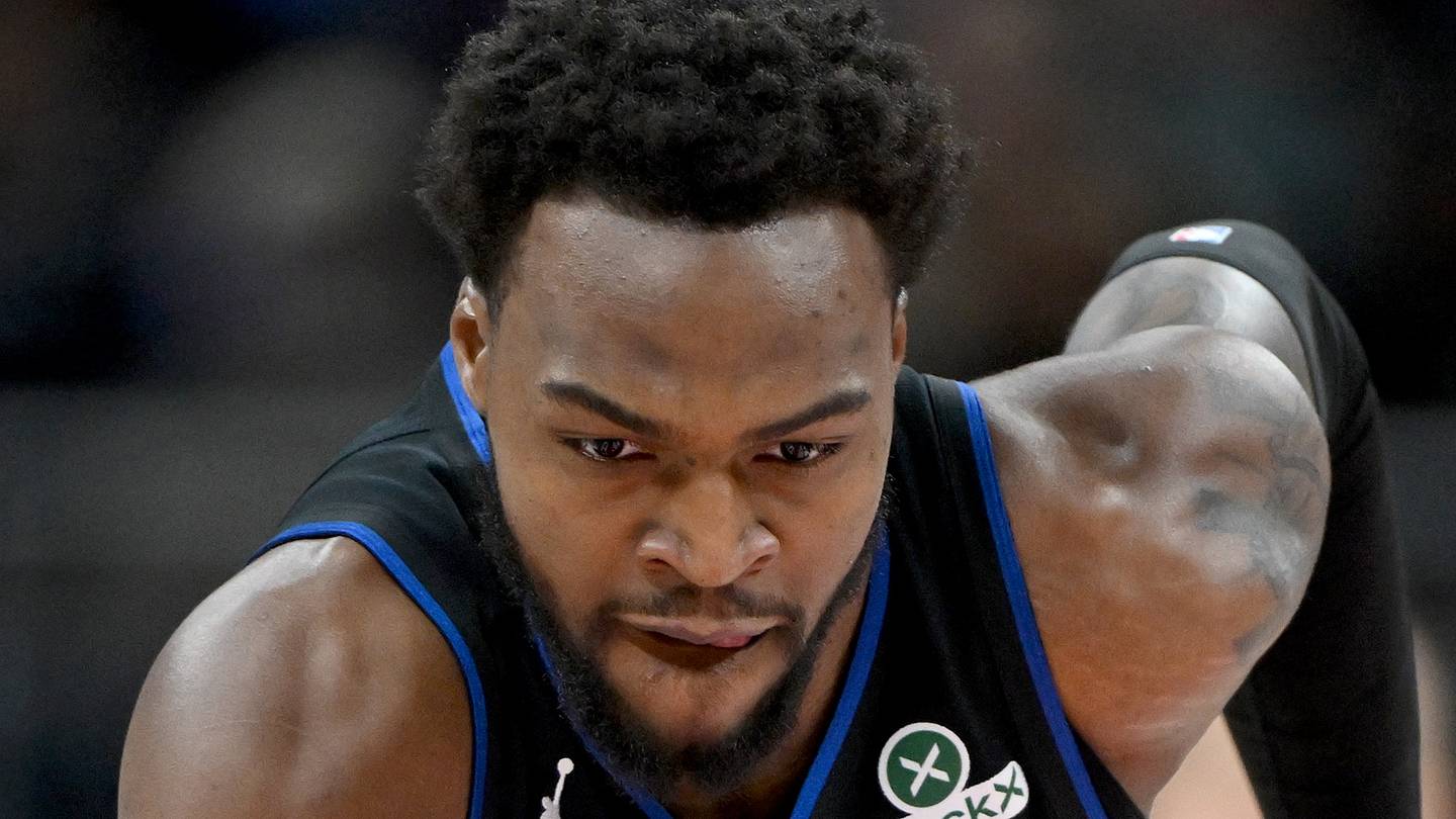 Detroit Pistons forward Paul Reed (7) chases down a loose ball against the Golden State Warriors in the first half at Little Caesars Arena on Mar 20, 2026.