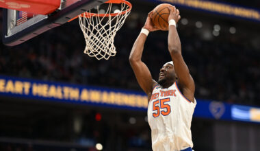 New York Knicks center Ariel Hukporti (55) attempts a slam dunk against the Washington Wizards during the fourth quarter at Capital One Arena.