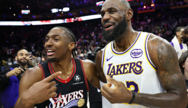Los Angeles Lakers forward Lebron James (23) and Philadelphia 76ers guard Tyrese Maxey react with each other after the game at Xfinity Mobile Arena.