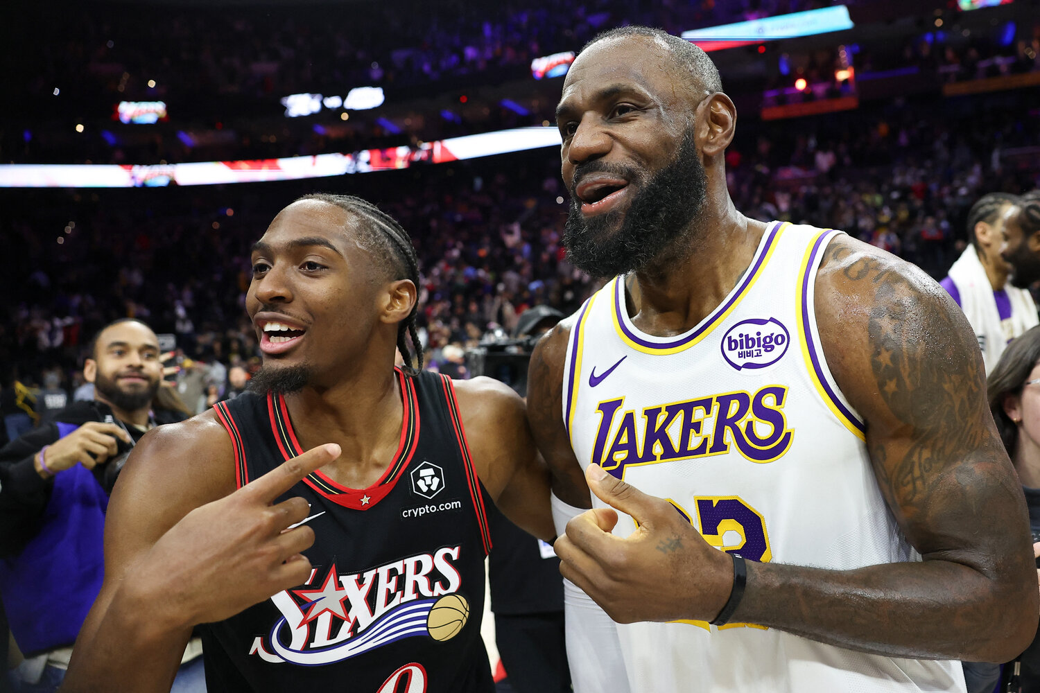 Los Angeles Lakers forward Lebron James (23) and Philadelphia 76ers guard Tyrese Maxey react with each other after the game at Xfinity Mobile Arena.