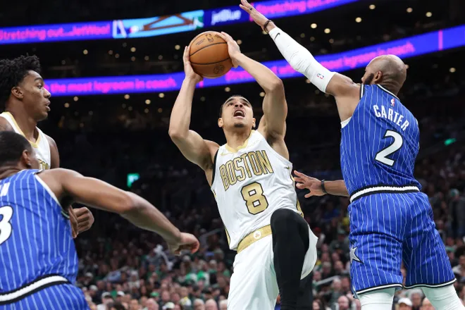 Apr 12, 2026; Boston, Massachusetts, USA; Boston Celtics guard John Tonje (8) shoots during the second half against the Orlando Magic at TD Garden. Mandatory Credit: Paul Rutherford-Imagn Images