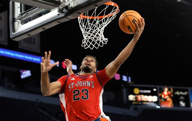 St. John's forward Bryce Hopkins (23) shoots a layup against Auburn during the second half of an NCAA college basketball game in the Players Era tournament Wednesday, Nov. 26, 2025, in Las Vegas. (AP Photo/Steve Marcus)