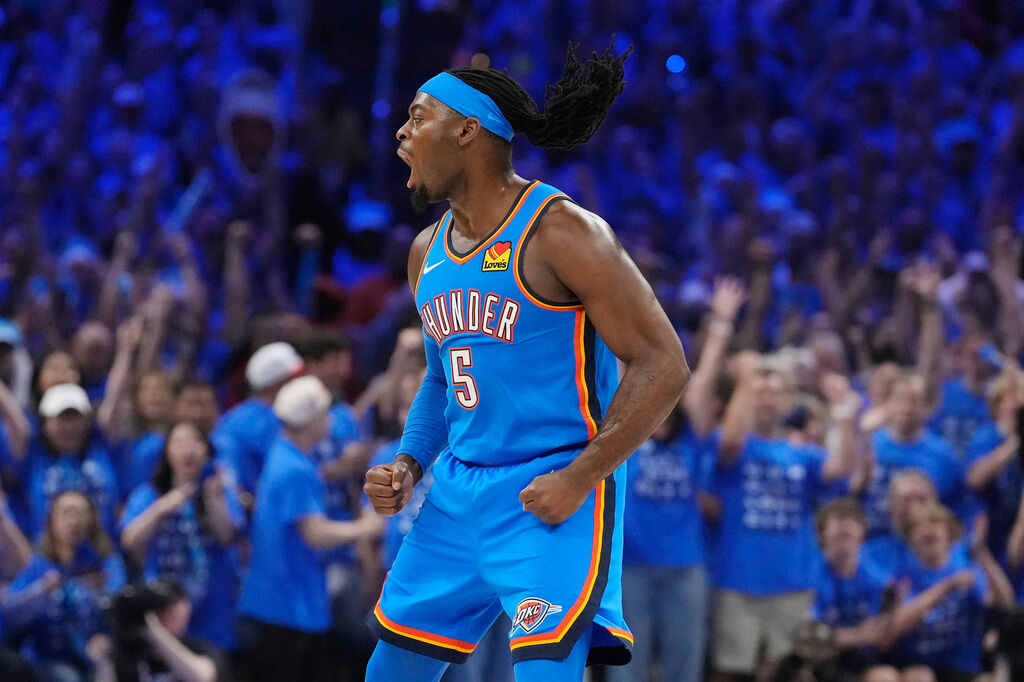 Oklahoma City Thunder guard Luguentz Dort celebrates a score against the San Antonio Spurs during the first half of Game 7 of the Western Conference finals of the NBA basketball playoffs series Saturday, May 30, 2026, in Oklahoma City. (AP Photo/Tony Gutierrez)