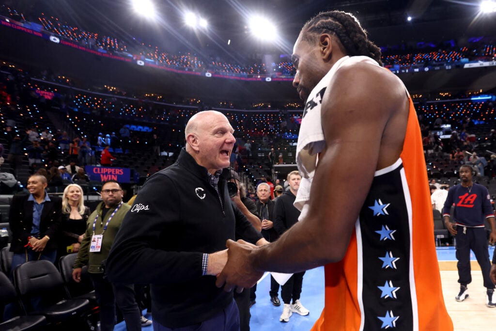 Owner Steve Ballmer of the Los Angeles Clippers congratulates Kawhi Leonard #2 after his 55-point game to win 112-99 against the Detroit Pistons at Intuit Dome on December 28, 2025 in Inglewood, California. NOTE TO USER: User expressly acknowledges and agrees that, by downloading and or using this photograph, user is consenting to the terms and conditions of the Getty Images License Agreement.