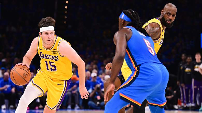 Lu Dort defends Austin Reaves while LeBron James sets a screen during a Lakers-Thunder game