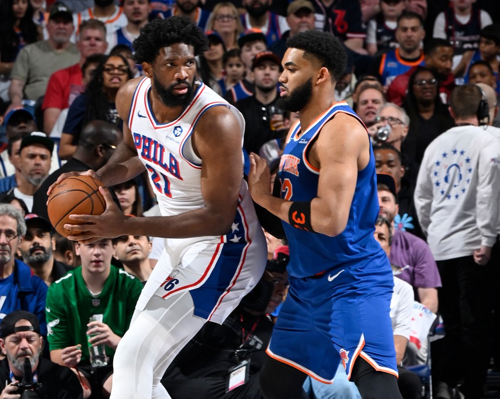 Karl-Anthony Towns #32 of the New York Knicks plays defense during the game against Joel Embiid #21 of the Philadelphia 76ers  during Round Two Game Four of the 2026 NBA Playoffs on May 10, 2026 at the Wells Fargo Center in Philadelphia, Pennsylvania