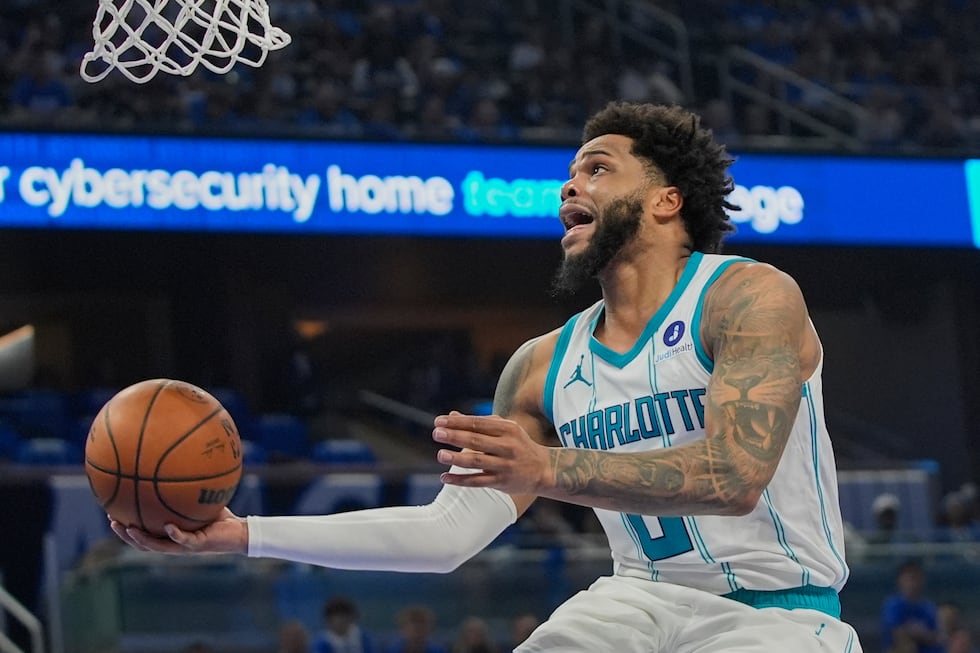 FILE - Charlotte Hornets forward Miles Bridges makes a shot against the Orlando Magic during...