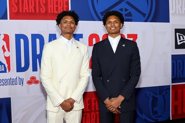 Amen and Ausar Thompson pose together on NBA Draft night