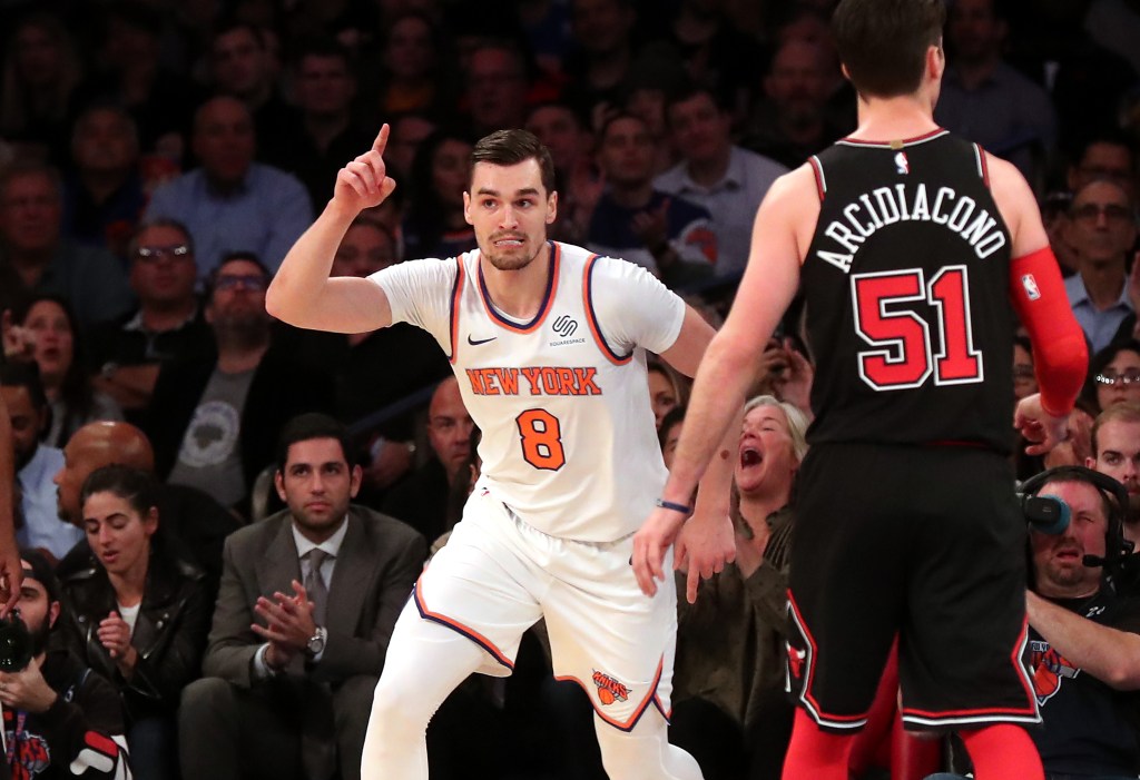 New York Knicks forward Mario Hezonja #8 reacts after hitting a shot during the second quarter against the Chicago Bulls.