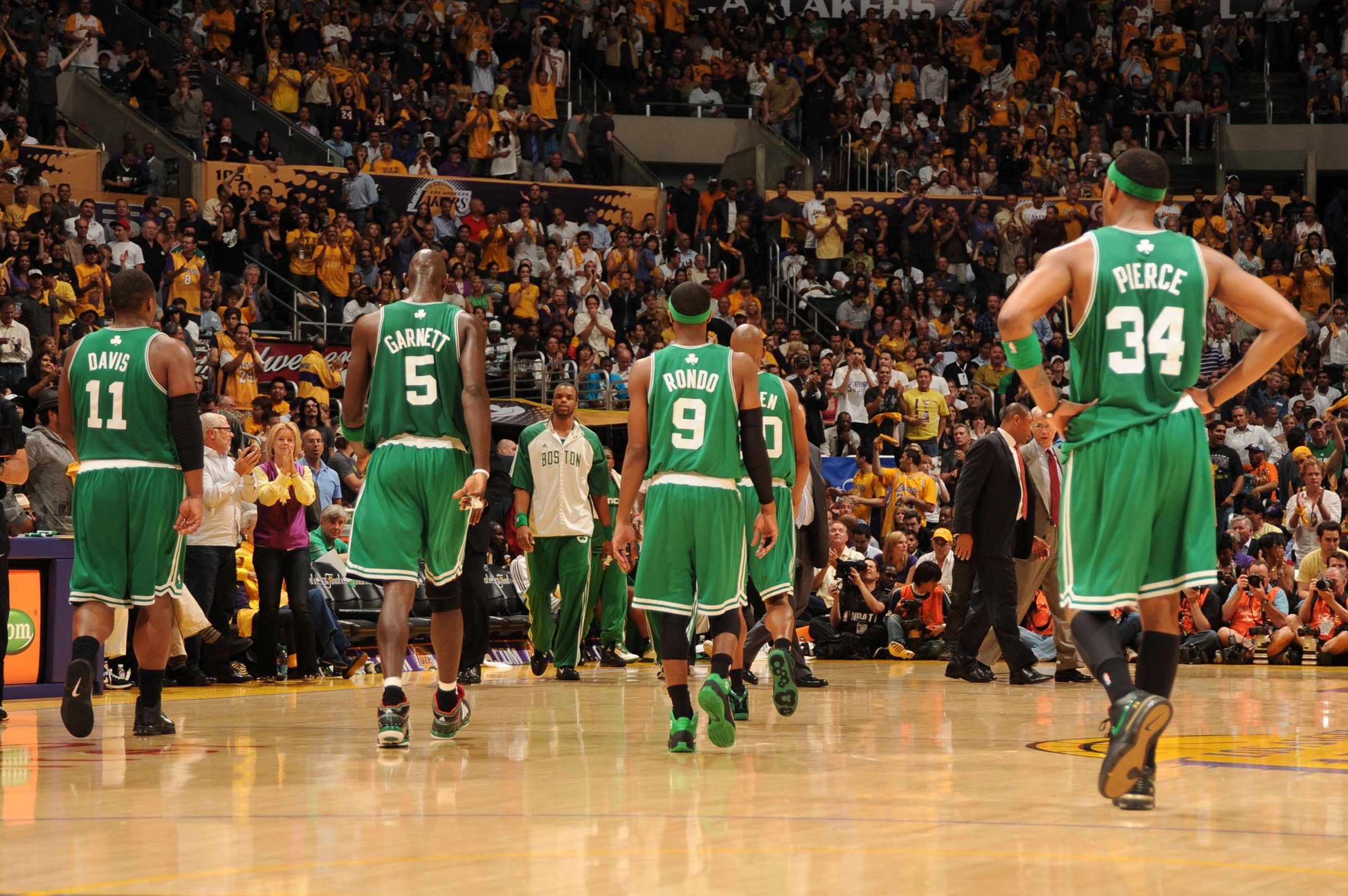 LOS ANGELES - JUNE 15: Glen Davis #11, Kevin Garnett #5, Rajon Rondo #9, Ray Allen #20, and Paul Pierce #34 of the Boston Celtics head to the bench against the Los Angeles Lakers in Game Six of the 2010 NBA Finals on June 15, 2010 at Staples Center in Los Angeles, California. NOTE TO USER: User expressly acknowledges and agrees that, by downloading and/or using this Photograph, user is consenting to the terms and conditions of the Getty Images License Agreement. Mandatory Copyright Notice: Copyright 2010 NBAE (Photo by Andrew D. Bernstein/NBAE via Getty Images)