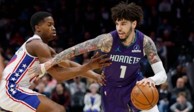 Charlotte Hornets guard LaMelo Ball (1) drives against Philadelphia 76ers guard V.J. Edgecombe during an NBA basketball game in Charlotte, N.C., Monday, Jan. 26, 2026. (AP File Photo/Nell Redmond)