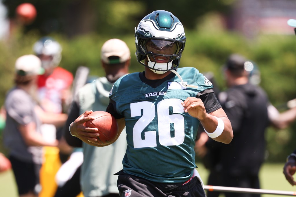 Philadelphia Eagles running back Saquon Barkley (26) runs drills during minicamp.