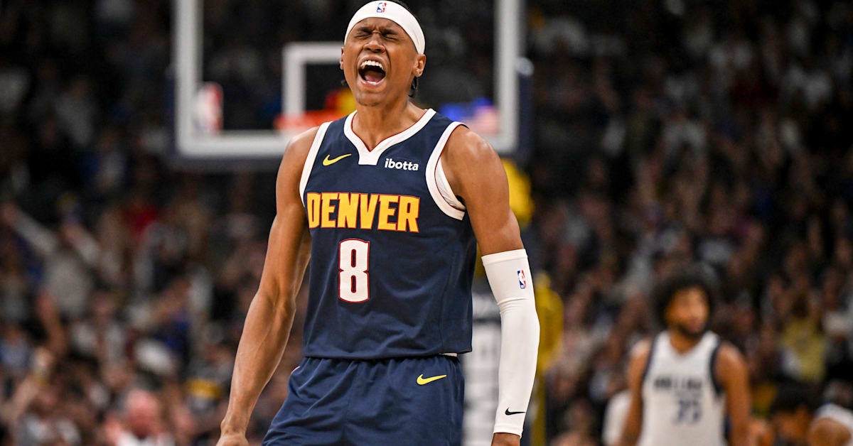 Peyton Watson celebrates after making a 3-pointer during the Nuggets win over the Dallas Mavericks.