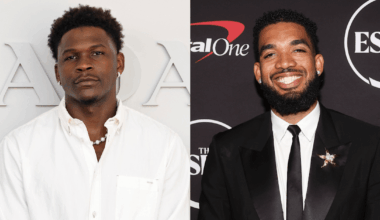 Anthony Edwards on the left wears a white shirt, and Karl-Anthony Towns on the right is smiling in a black suit and tie.