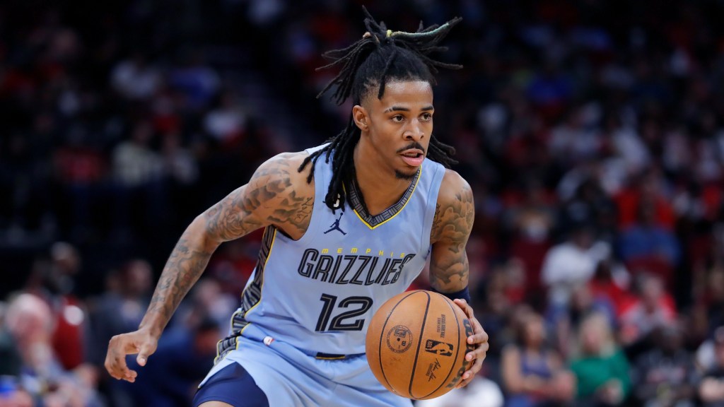 Memphis Grizzlies guard Ja Morant dribbling the basketball.