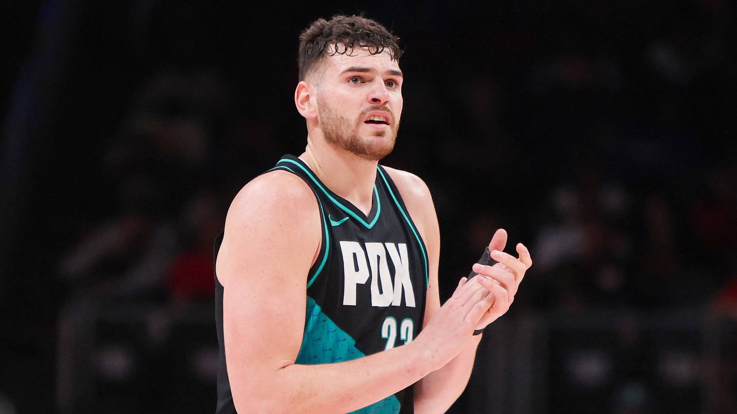 Mar 1, 2026; Atlanta, Georgia, USA; Portland Trail Blazers center Donovan Clingan (23) reacts after a timeout against the Atlanta Hawks in the third quarter at State Farm Arena. Mandatory Credit: Brett Davis-Imagn Images