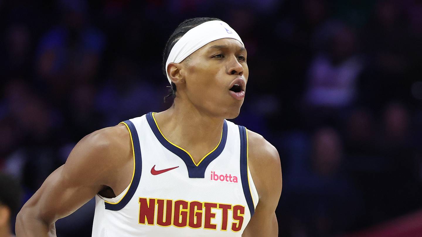 Jan 5, 2026; Philadelphia, Pennsylvania, USA; Denver Nuggets guard Peyton Watson (8) reacts to his score against the Philadelphia 76ers during the first quarter at Xfinity Mobile Arena. Mandatory Credit: Bill Streicher-Imagn Images