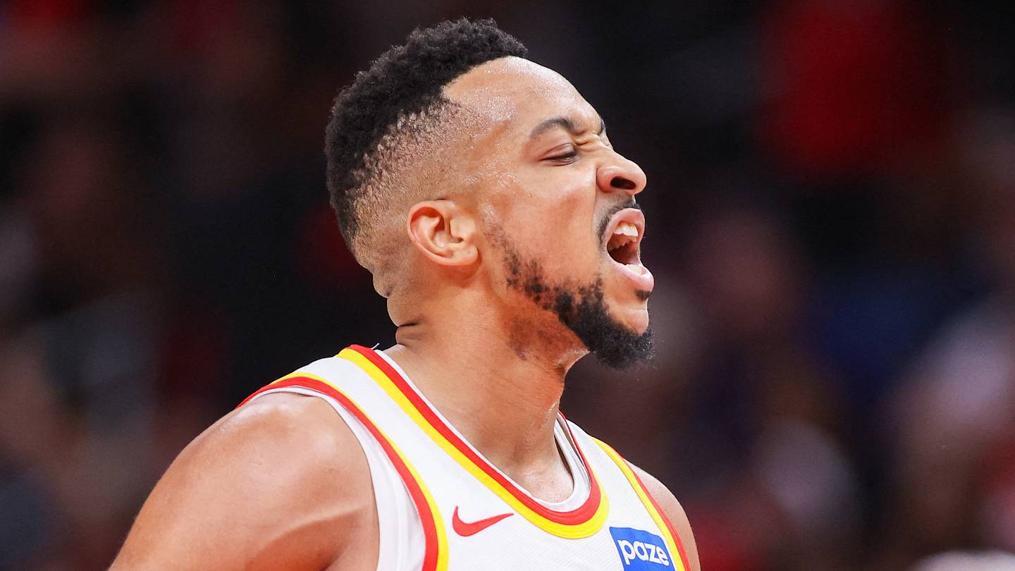 Atlanta Hawks guard CJ McCollum (3) reacts against the New York Knicks at State Farm Arena on April 23, 2026.