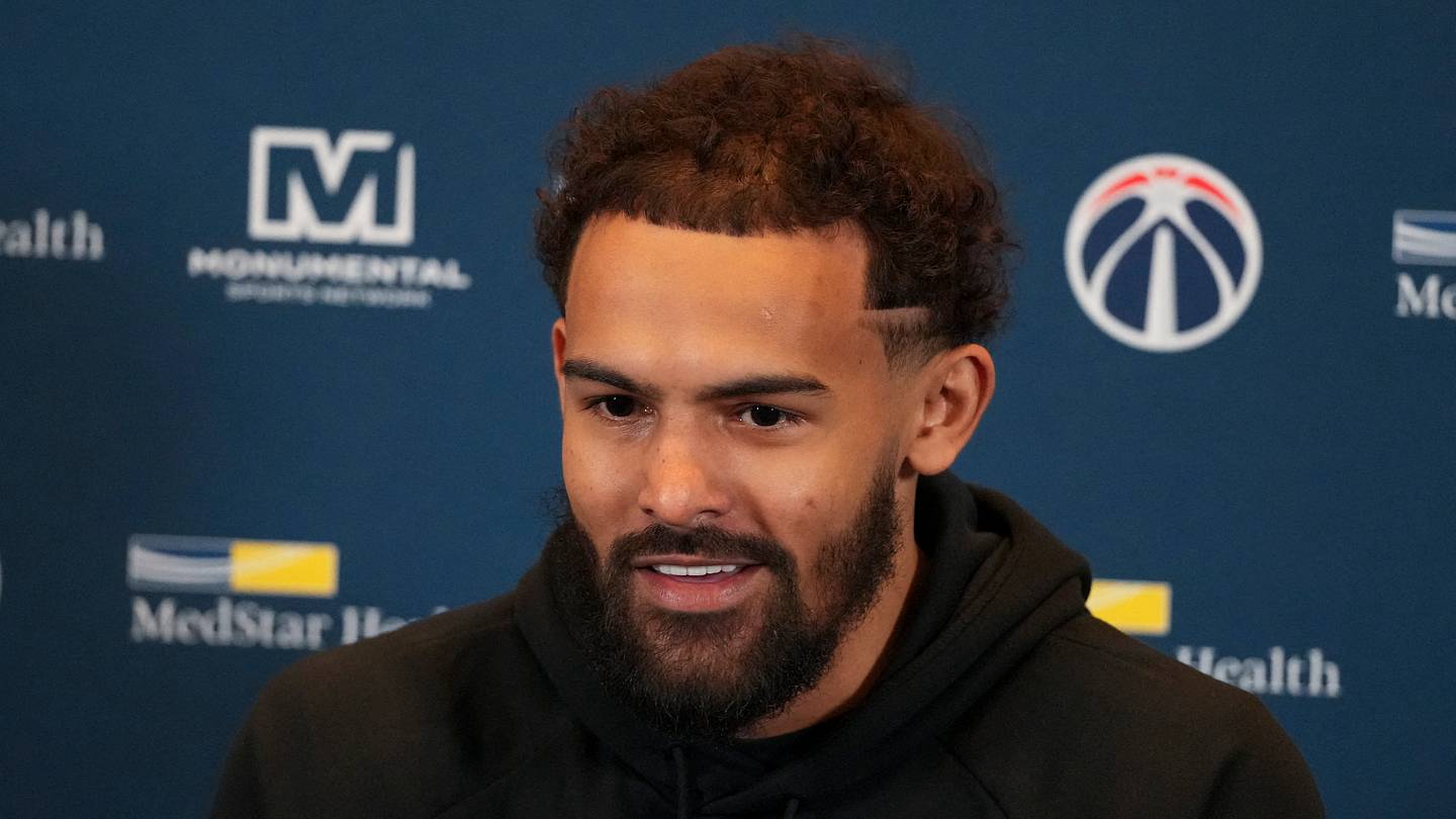 Feb 24, 2026; Atlanta, Georgia, USA; Washington Wizards guard Trae Young (3) meets with the media during his first return to play the Atlanta Hawks at State Farm Arena. Mandatory Credit: Dale Zanine-Imagn Images