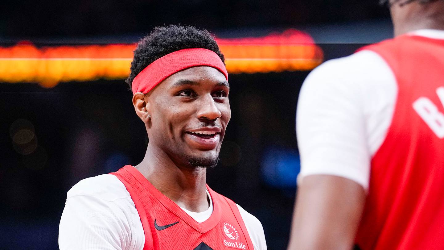 Apr 12, 2026; Toronto, Ontario, CAN; Toronto Raptors guard Ja'kobe Walter (14) celebrates a basket against the Brooklyn Nets with forward RJ Barrett (9) during the second half at Scotiabank Arena. Mandatory Credit: Kevin Sousa-Imagn Images