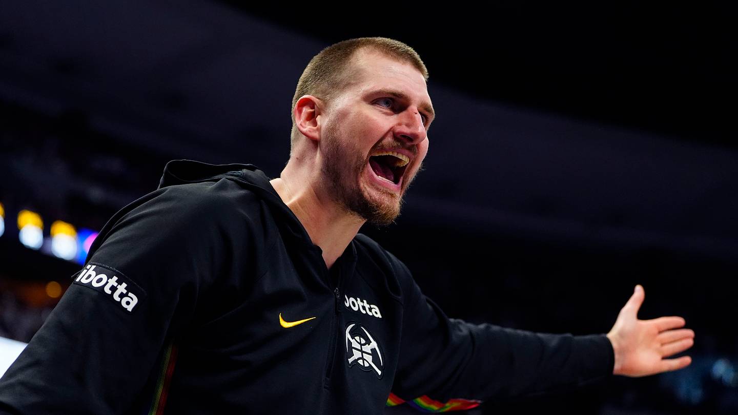 Apr 4, 2026; Denver, Colorado, USA; Denver Nuggets center Nikola Jokic (15) reacts to a referee in the second quarter against the San Antonio Spurs at Ball Arena. Mandatory Credit: Ron Chenoy-Imagn Images