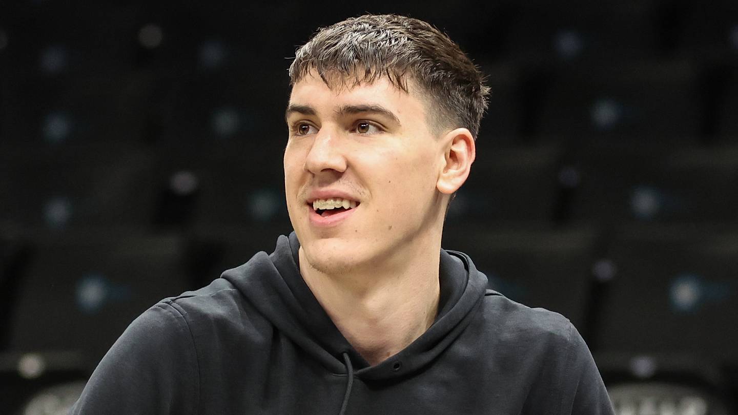 Feb 3, 2026; Brooklyn, New York, USA;  Los Angeles Lakers forward Jake LaRavia (12) warms up prior to the game against the Brooklyn Nets at Barclays Center. Mandatory Credit: Wendell Cruz-Imagn Images