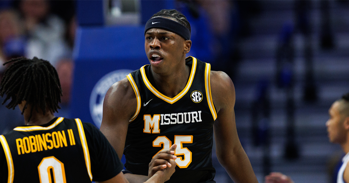 Jan 7, 2026; Lexington, Kentucky, USA; Missouri Tigers forward Mark Mitchell (25) celebrates with guard Anthony Robinson II (0) during the second half against the Kentucky Wildcats at Rupp Arena at Central Bank Center. Mandatory Credit: Jordan Prather-Imagn Images