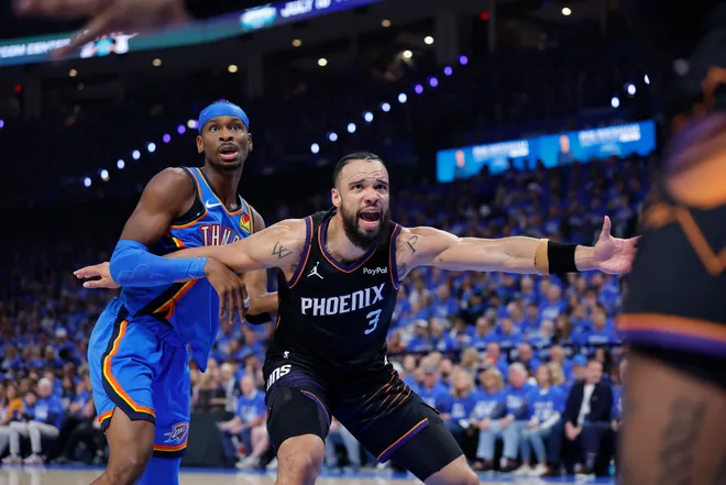 Apr 19, 2026; Oklahoma City, Oklahoma, USA; Phoenix Suns forward Dillon Brooks (3) yells to his teammate for the ball as Oklahoma City Thunder guard Shai Gilgeous-Alexander (2) defends in the second quarter during game one of the first round of the 2026 NBA Playoffs at Paycom Center. Mandatory Credit: Alonzo Adams-Imagn Images