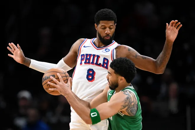 Apr 21, 2026; Boston, Massachusetts, USA; Philadelphia 76ers forward Paul George (8) defends Boston Celtics forward Jayson Tatum (0) in the first half of a game two of the first round of the 2026 NBA Playoffs at TD Garden. Mandatory Credit: Brian Fluharty-Imagn Images