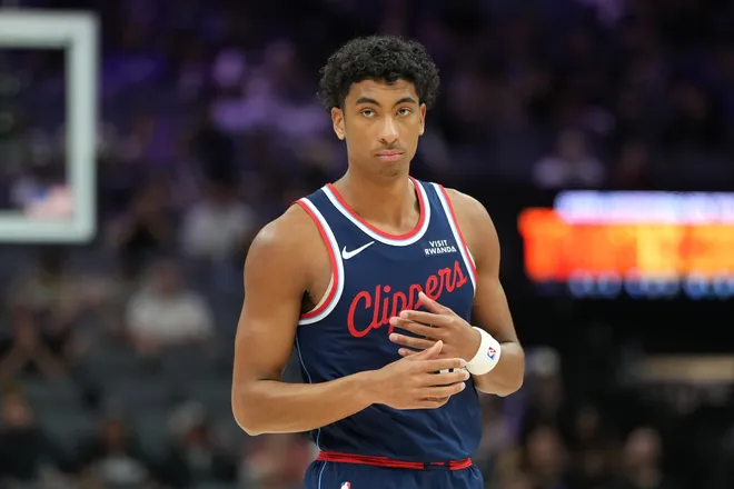 Apr 5, 2026; Sacramento, California, USA; LA Clippers guard Cam Christie (12) during the fourth quarter against the Sacramento Kings at Golden 1 Center. Mandatory Credit: Darren Yamashita-Imagn Images