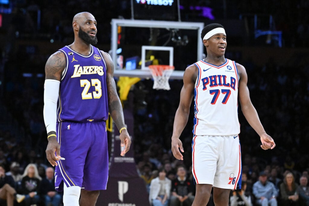 LeBron James #23 of the Los Angeles Lakers and Vj Edgecombe #77 of the Philadelphia 76ers smile during the second half of the game between the two teams at Crypto.com Arena on February 05, 2026