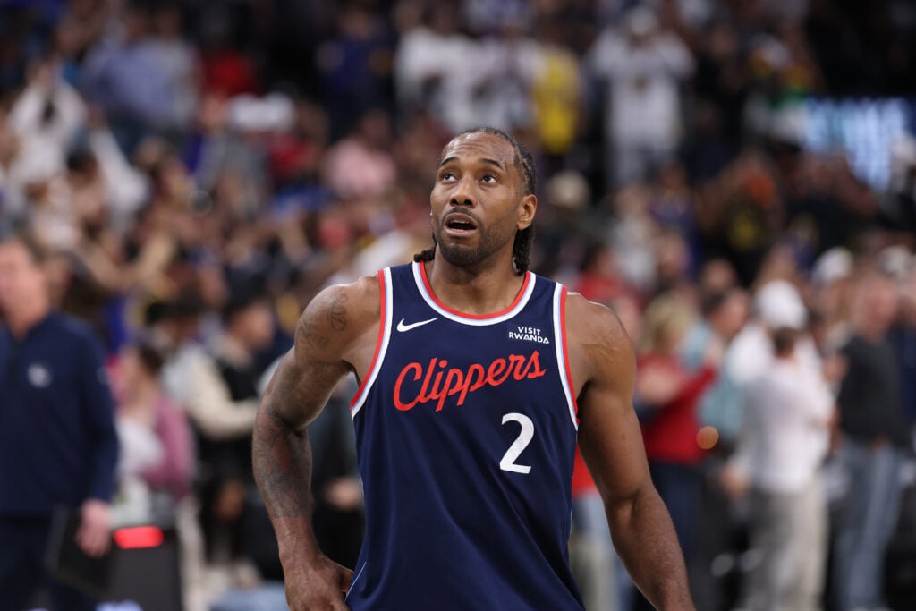 Clippers forward Kawhi Leonard, #2, walks off the court after their season-ending loss to the Golden State Warriors during an NBA play-in-tournament at the Intuit Dome.