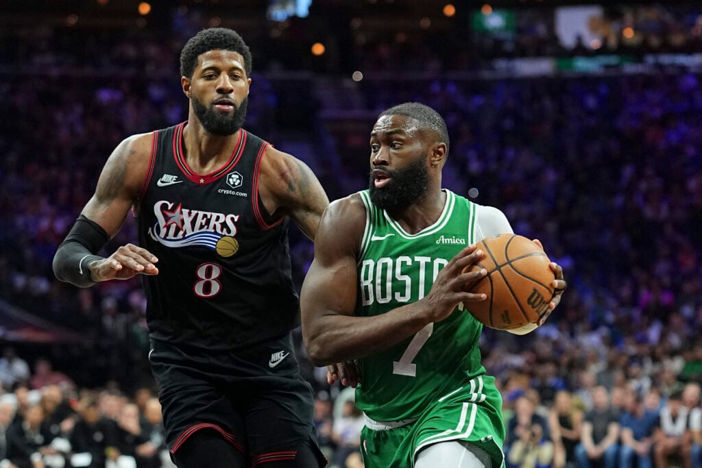 Jaylen Brown #7 of the Boston Celtics drives to the basket against Paul George #8 of the Philadelphia 76ers in the third quarter during game three of the Eastern Conference first round playoffs at Xfinity Mobile Arena on April 24, 2026 in Philadelphia, Pennsylvania.