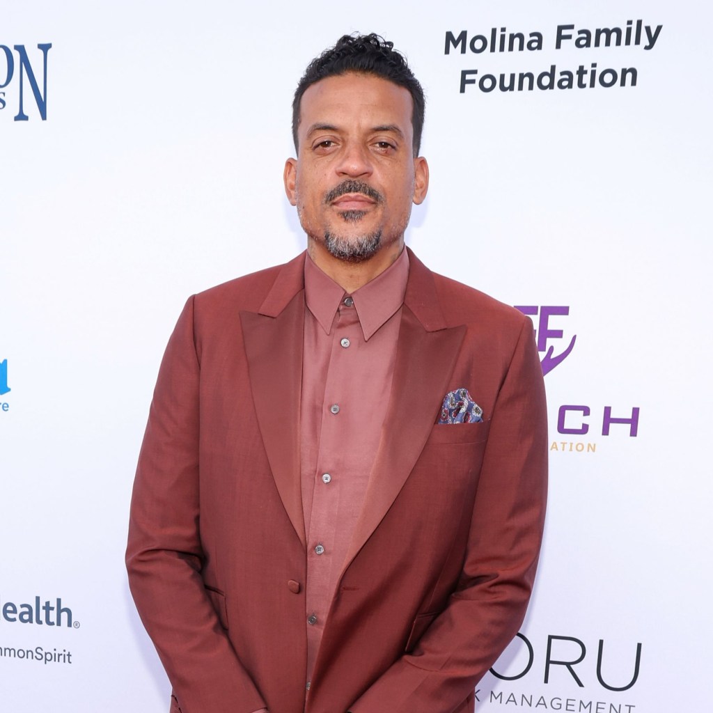 Matt Barnes in a reddish-brown suit at the Harold & Carole Pump Foundation's 26th Anniversary Celebrity Dinner.
