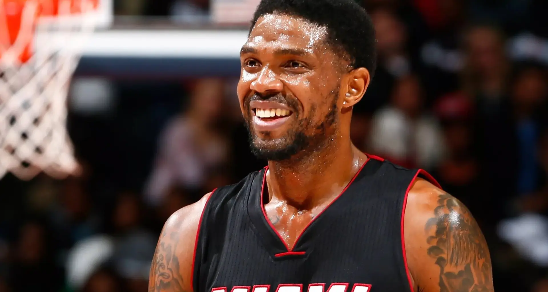 photo of a smiling udonis haslem in a miami heat jersey