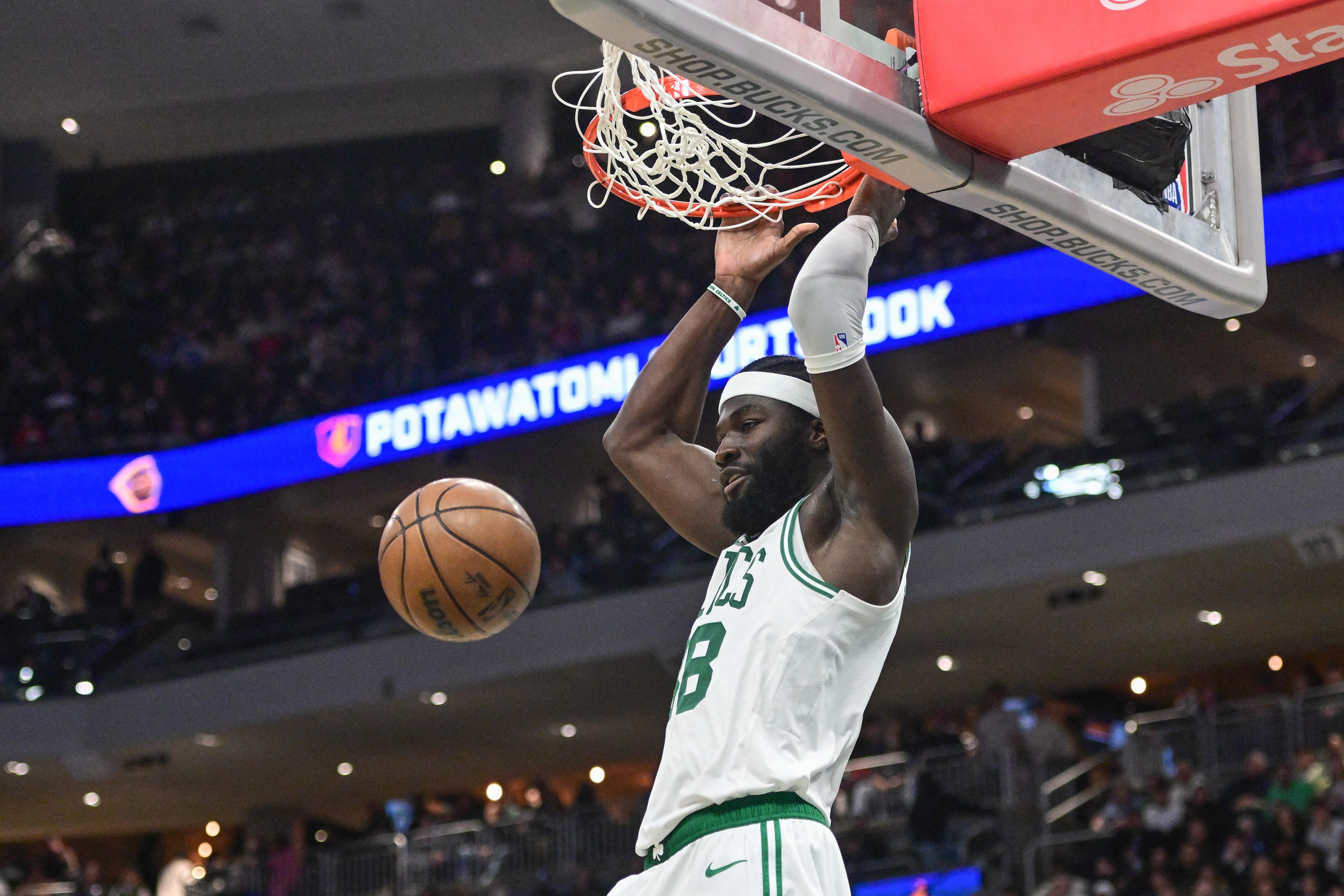 Boston Celtics center Neemias Queta (88) dunks the ball against the Milwaukee Bucks in the third quarter at Fiserv Forum in Milwaukee, Wisconsin, Apr 3, 2026.
