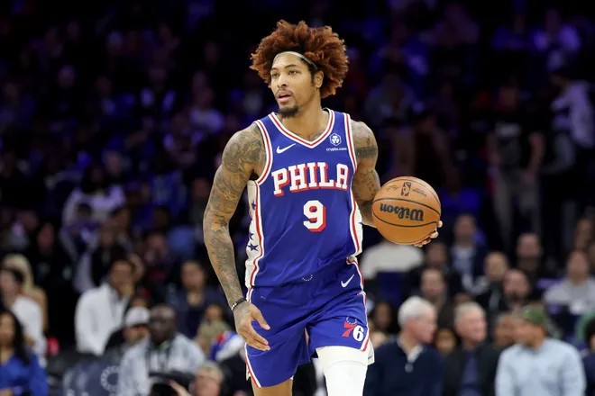 PHILADELPHIA, PENNSYLVANIA - NOVEMBER 11: Kelly Oubre Jr. #9 of the Philadelphia 76ers dribbles the ball during the first half against the Boston Celtics at Xfinity Mobile Arena on November 11, 2025 in Philadelphia, Pennsylvania. NOTE TO USER: User expressly acknowledges and agrees that, by downloading and or using this photograph, User is consenting to the terms and conditions of the Getty Images License Agreement. (Photo by Emilee Chinn/Getty Images)