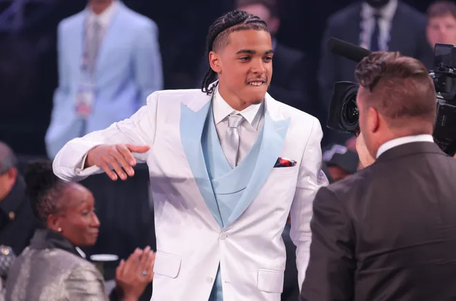 Jun 23, 2026; New York, NY, USA; The sixth pick in the 2026 NBA draft, Louisville guard Mikel Brown Jr. reacts after he was selected by the Brooklyn Nets at Barclays Center. Mandatory Credit: Brad Penner-Imagn Images