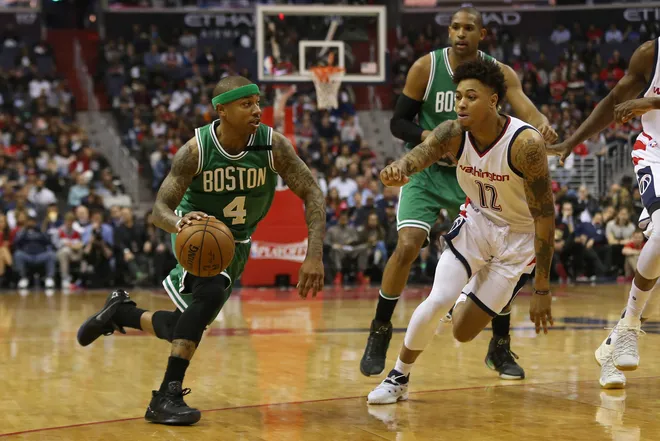 May 12, 2017; Washington, DC, USA; Boston Celtics guard Isaiah Thomas (4) dribbles the ball as Washington Wizards forward Kelly Oubre Jr. (12) defends in the first quarter in game six of the second round of the 2017 NBA Playoffs at Verizon Center. Mandatory Credit: Geoff Burke-USA TODAY Sports
