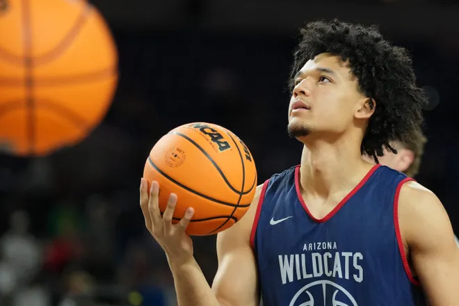 Apr 3, 2026; Indianapolis, IN, USA; Arizona Wildcats guard Brayden Burries (5) looks on during a practice session ahead of the Final Four of the men's 2026 NCAA Tournament at Lucas Oil Stadium. Mandatory Credit: Robert Deutsch-Imagn Images