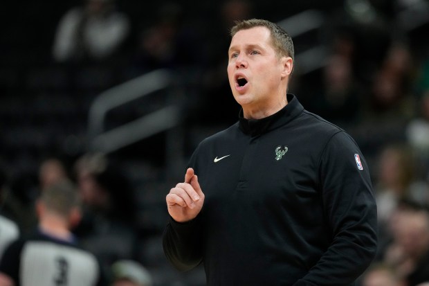 Milwaukee Bucks assistant coach Dave Joerger talks to an official during an NBA basketball game against the Cleveland Cavaliers, Tuesday, March 17, 2026, in Milwaukee. (AP Photo/Aaron Gash)