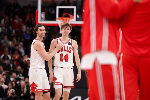 Bulls guard Josh Giddey and forward Matas Buzelis celebrate after taking an 8-point lead during the fourth quarter against the Bucks at the United Center on March 1, 2026. (Eileen T. Meslar/Chicago Tribune)